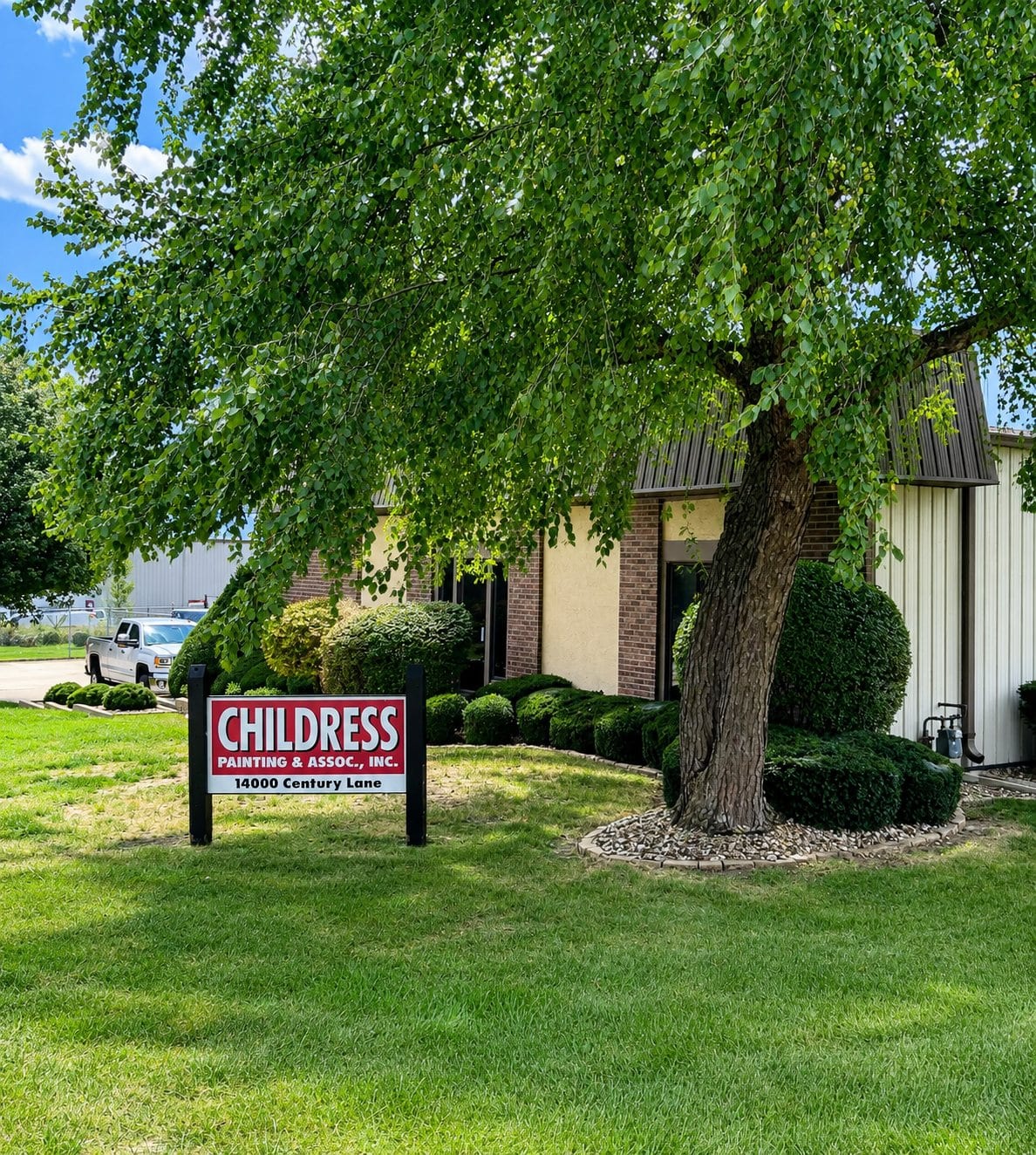 The Childress Painting office at 14000 Century Lane in Grandview, Missouri, with the company sign at the entrance
